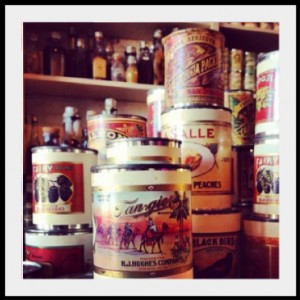 This is an image of cans with vintage labels